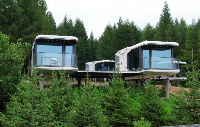 space capsule house exterior view space capsule house for resort accommodation space capsule cabin with scenic outdoor view
